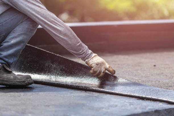 Professional Emergency Waterproofing technician working in Paeonian Springs, VA